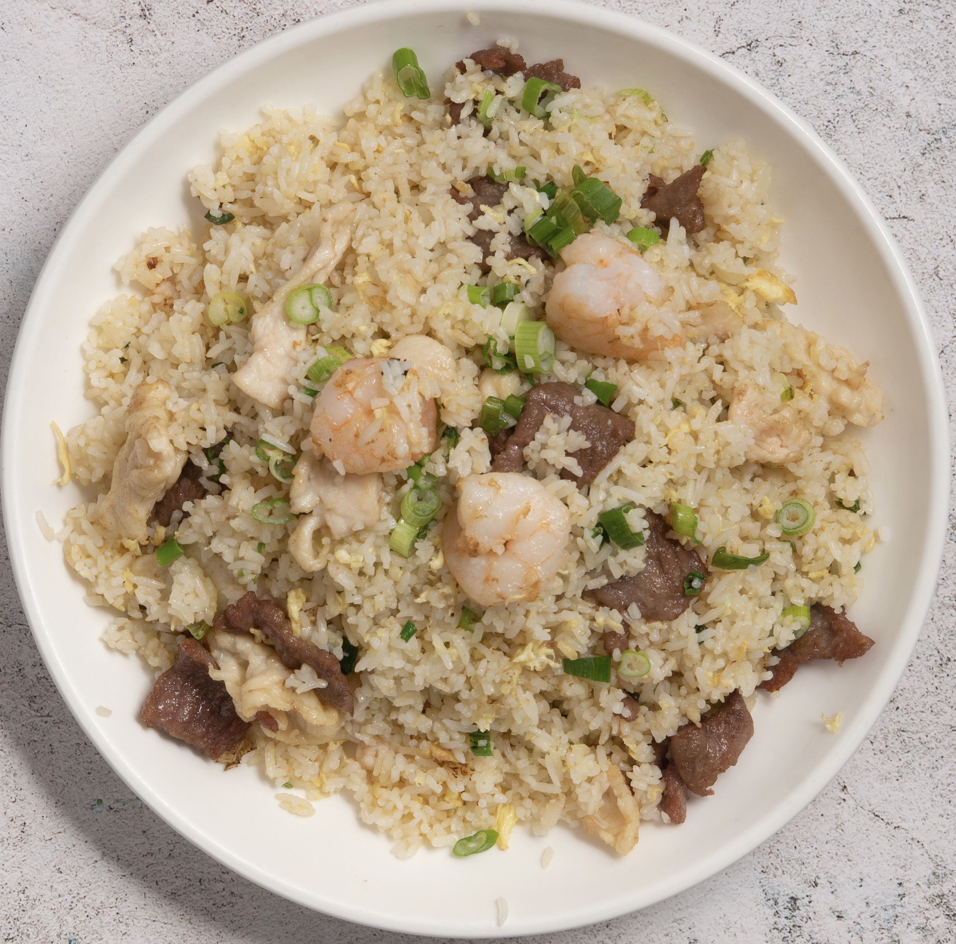 1702. Combination Fried Rice (Beef, Chicken & Shrimp)招牌炒飯(牛,雞,蝦)