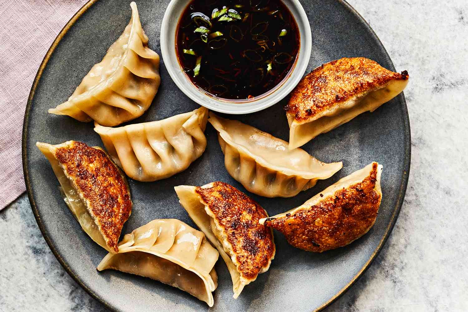 11. Steamed or Fried Pork Dumplings (8)